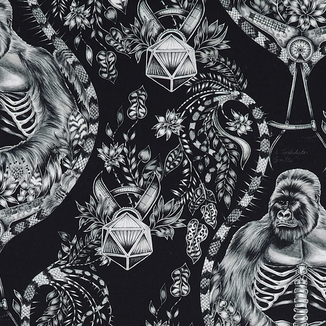 Silver-grey gorillas, flowers and geometric motifs on a charcoal-black fabric ground