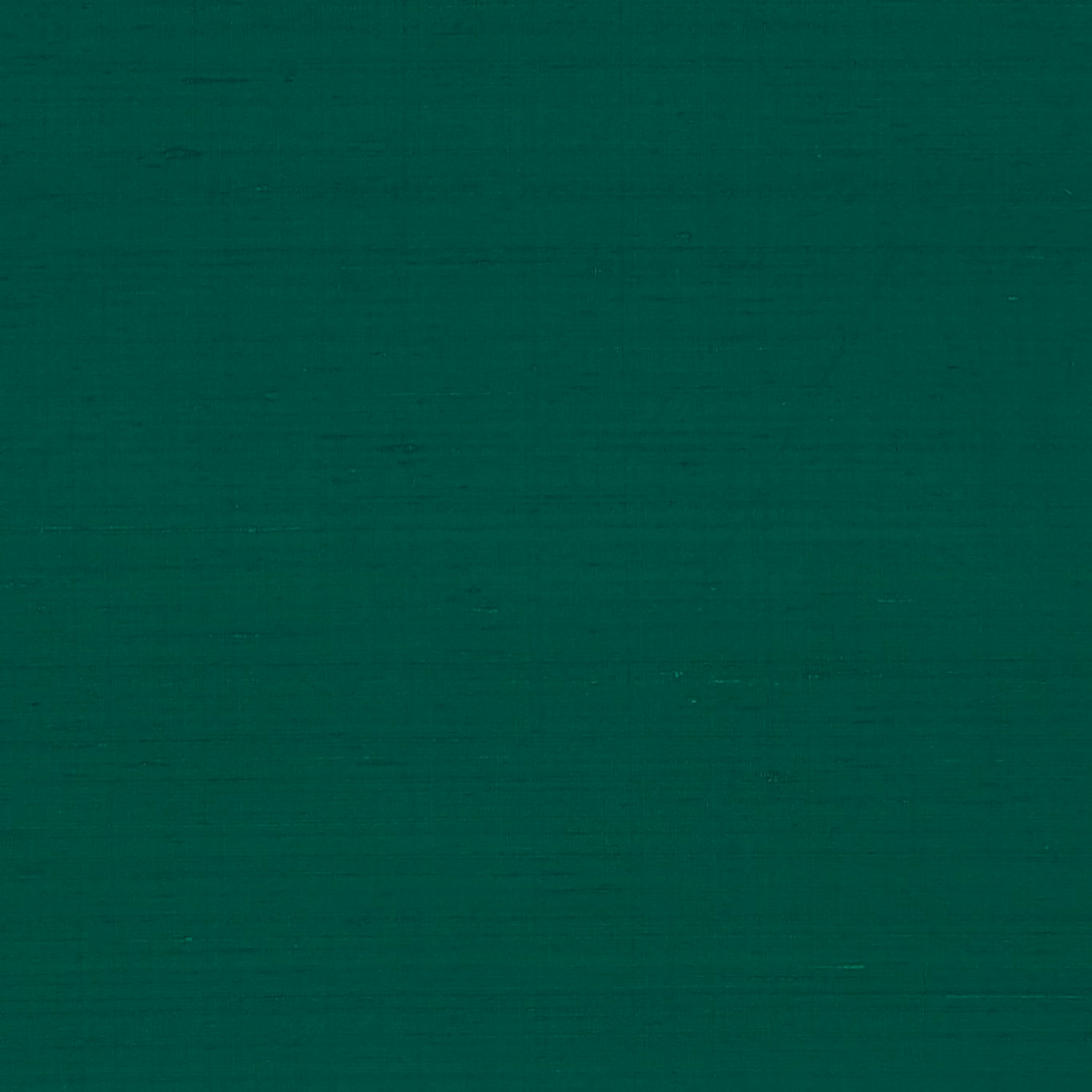 Deep emerald-green fabric with subtle horizontal slub texture and soft tonal variation