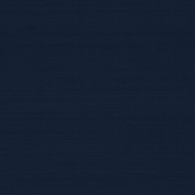 Close view of deep ink navy fabric with subtle horizontal woven texture