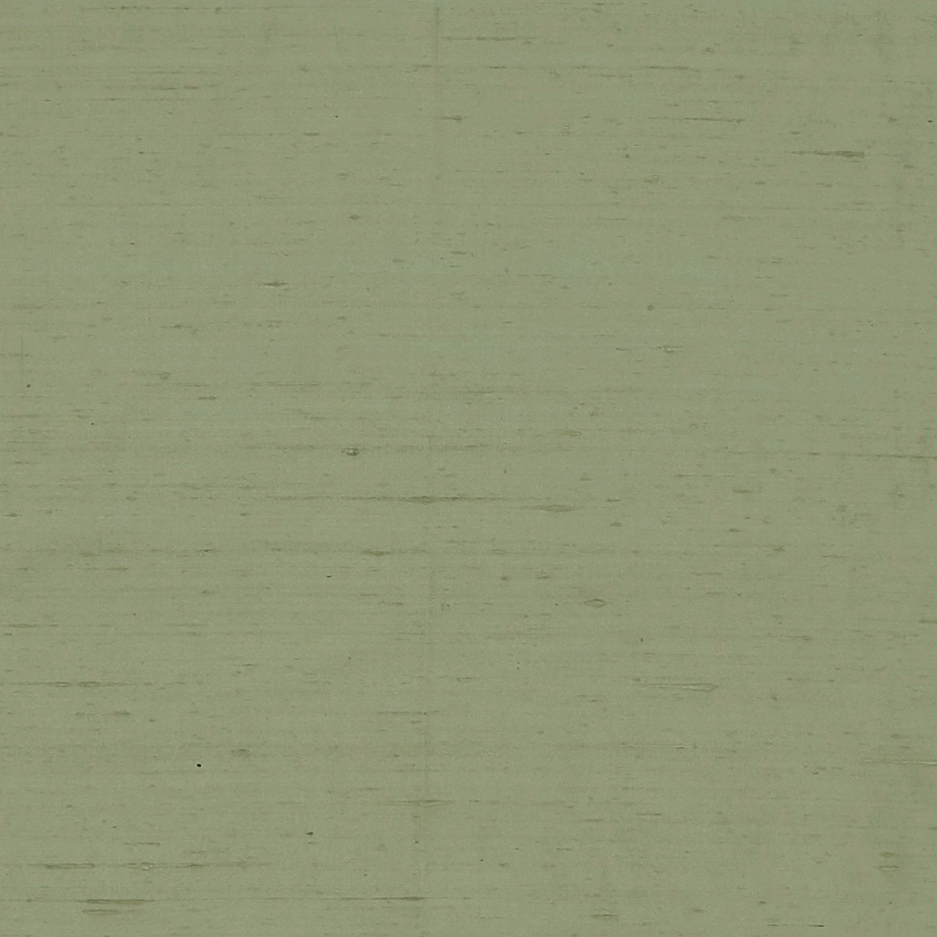 Close-up of muted pistachio green fabric with fine horizontal striations and tonal flecks