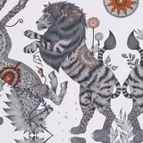 Pale nude wallpaper with charcoal striped animals, spotted creatures and rust floral motifs