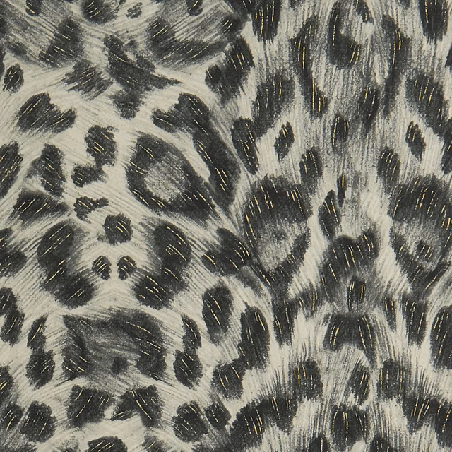 Charcoal and gold leopard spots brushed across a pale grey ground