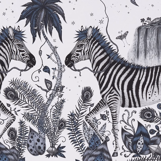 Ink-blue zebra, palm, giraffe and peacock motifs on a pale wallpaper ground