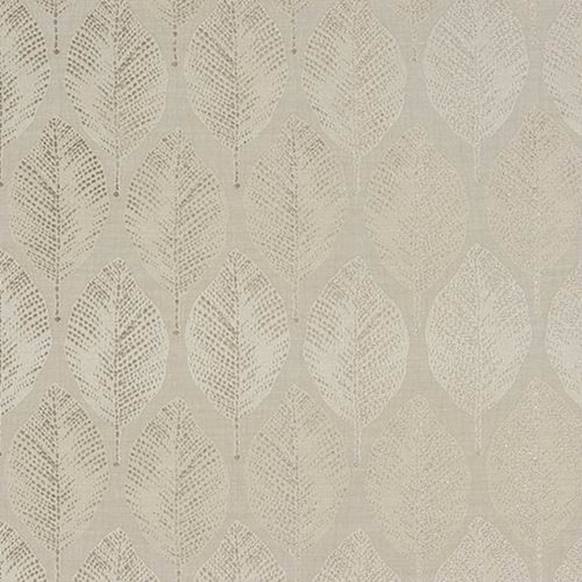 Close-up of pale cream leaf-pattern fabric with a soft woven texture