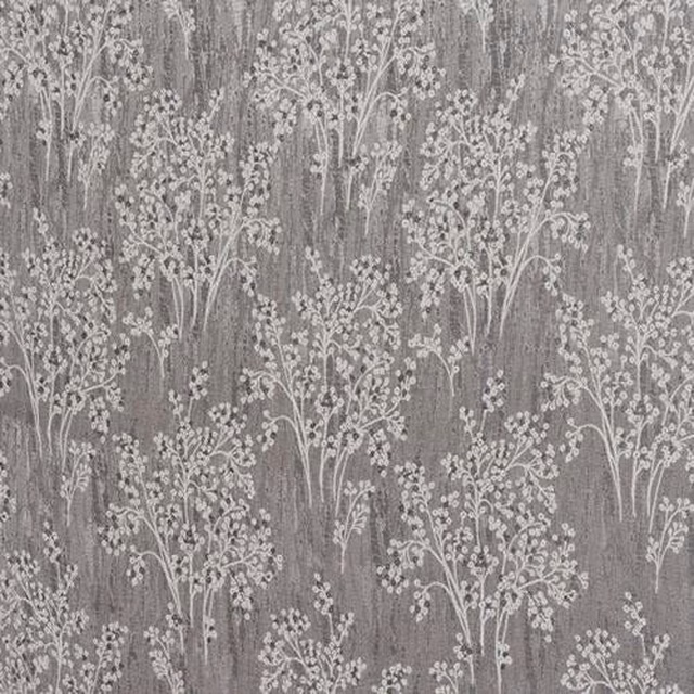Grey botanical fabric with pale trailing floral stems and textured ground