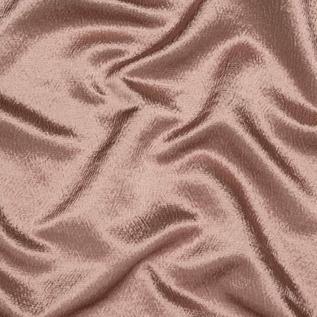 Dusky pink lustrous fabric with soft crumpled folds and subtle sheen