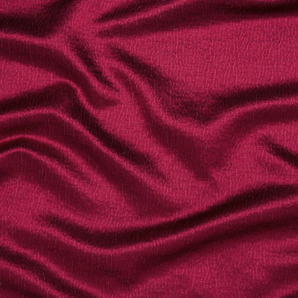 Deep fuchsia pink fabric with a fine woven texture and soft draped folds