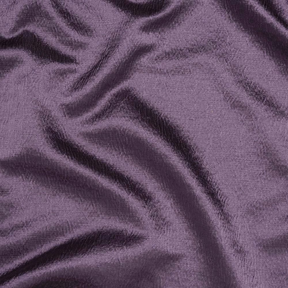 Close-up of heathered mauve-purple woven fabric with soft folds and texture