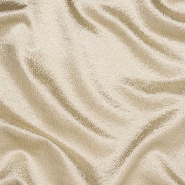Creamy linen-look fabric with soft sheen and flowing tonal folds