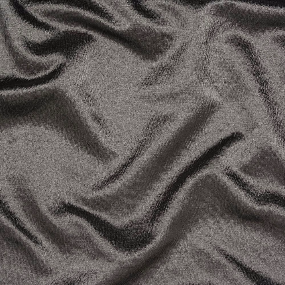 Pewter grey textured fabric with dark shadowed folds and soft sheen
