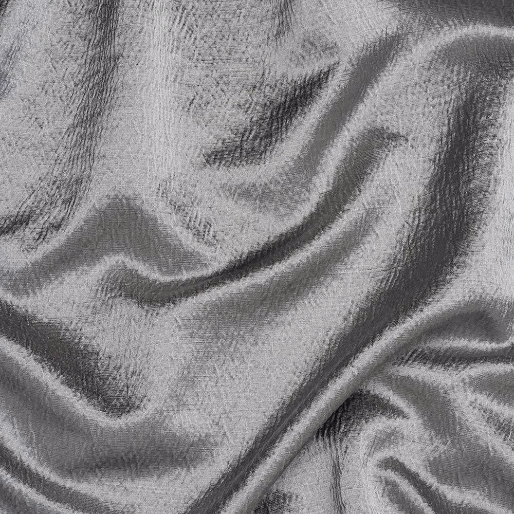 Shimmering silver-grey fabric with crumpled texture and darker shadowed folds