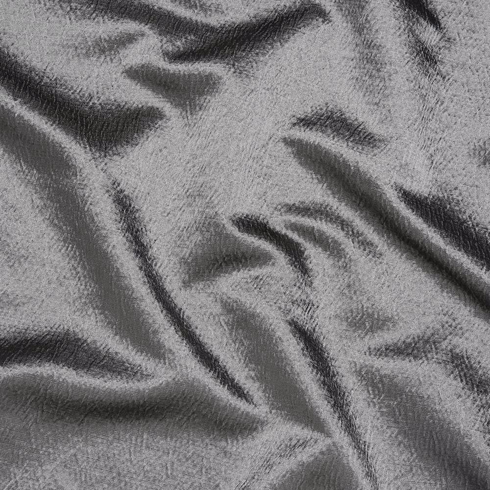 Wrinkled slate grey fabric with subtle sheen and textured weave