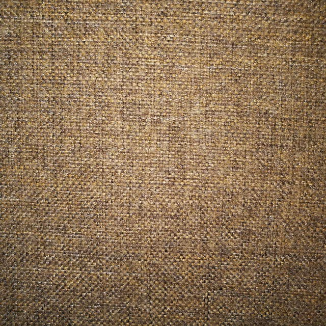 Close-up of warm praline beige woven fabric with fine tonal flecks
