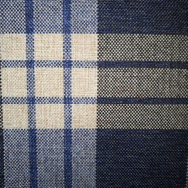 Close-up of indigo, ivory and charcoal checked woven fabric