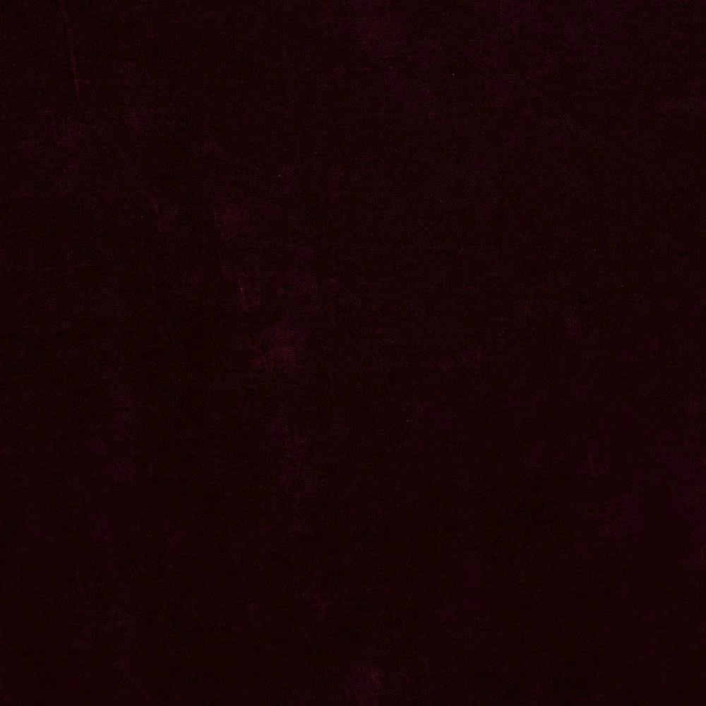 Deep mulberry fabric with a nearly black velvet-like surface texture