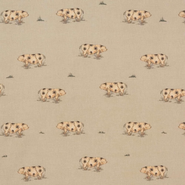 Soft beige cotton fabric with small spotted animal motifs and tiny grass tufts