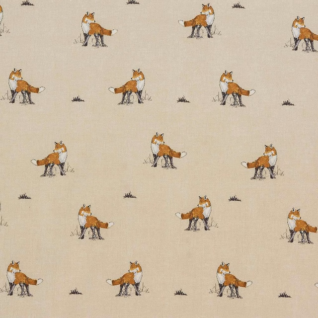 Cream cotton fabric with small fox motifs scattered across the surface
