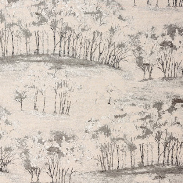 Soft charcoal tree landscape print on a pale neutral fabric ground