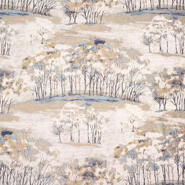 Painterly indigo and cream fabric with tree motifs and soft landscape forms