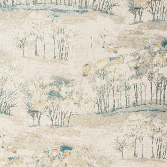 Pale landscape print fabric with seafoam trees and ivory ground