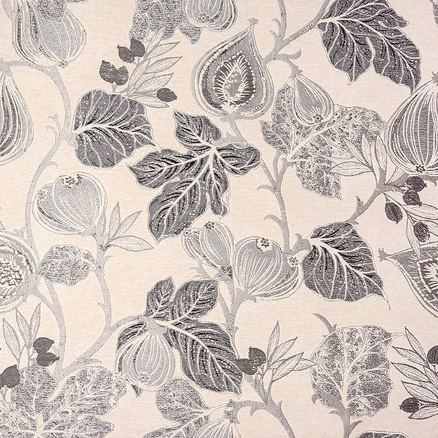 Charcoal grey botanical fabric with large leaves on a pale ground