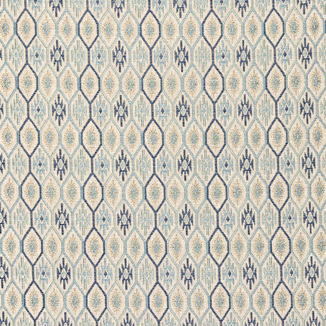 Cream fabric swatch with indigo geometric diamond and floral motifs