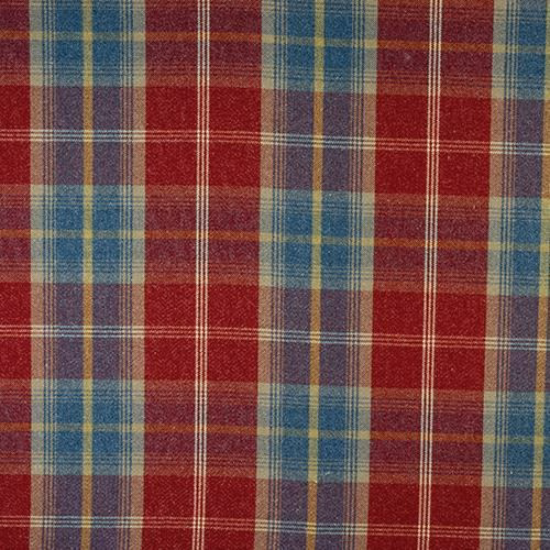 Close-up of ruby red tartan fabric with blue, gold and green checks