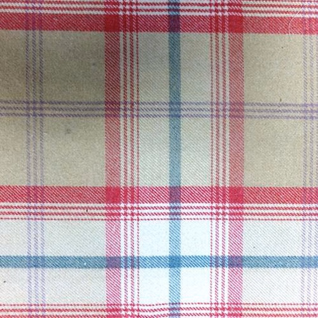 Checked fabric swatch in pink, blue and soft beige plaid weave