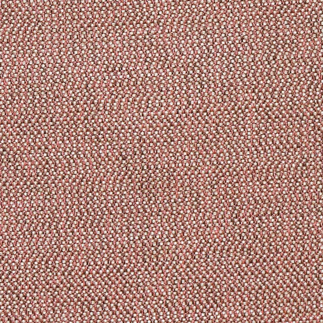 Close-up of a dusty coral pink woven fabric with tiny cream flecks