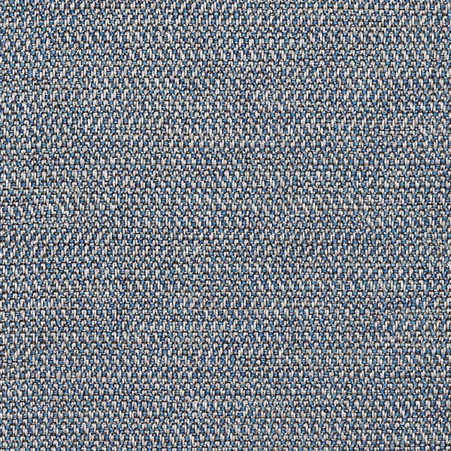 Close-up of a blue-grey woven fabric with fine speckled texture