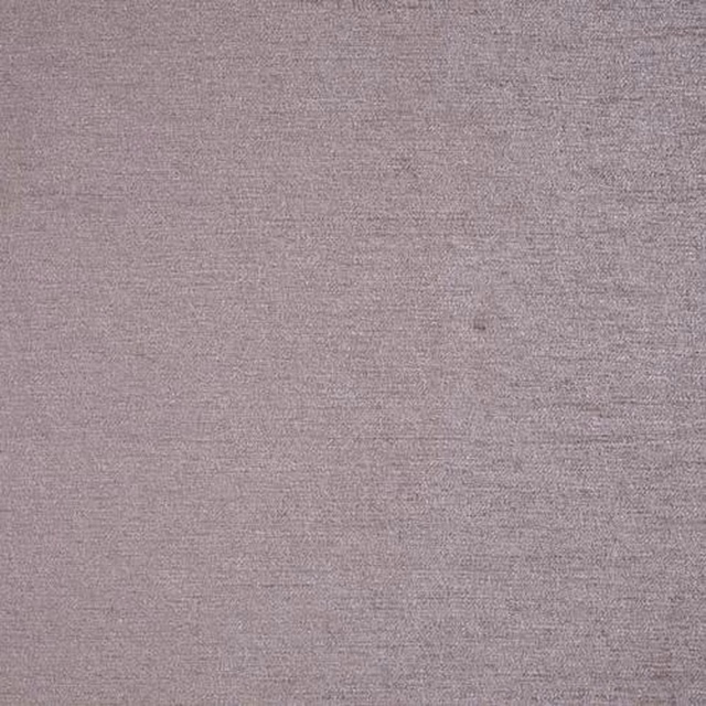 Close-up of a soft dusty blush plain-woven fabric with subtle texture