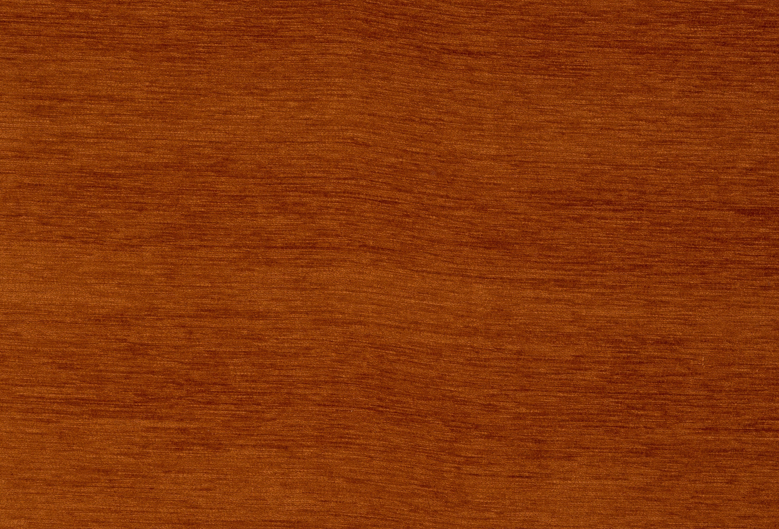 Close-up of burnt terracotta woven fabric with fine horizontal texture