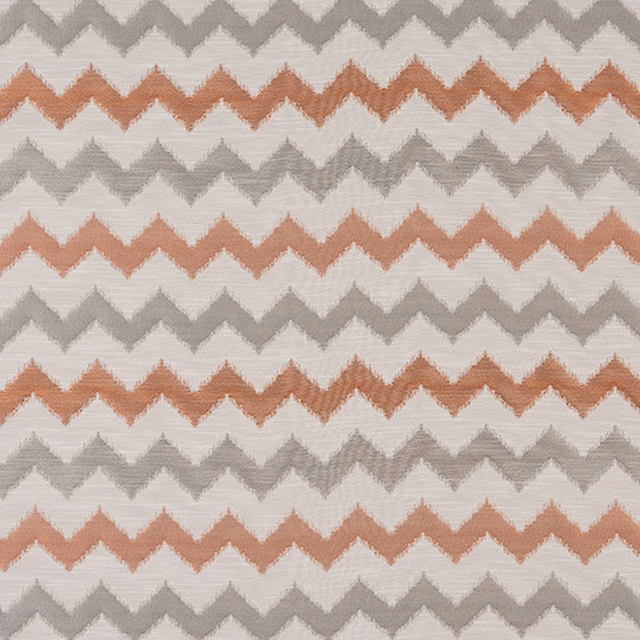 Terracotta, ivory and grey zigzag woven fabric with a soft textured finish