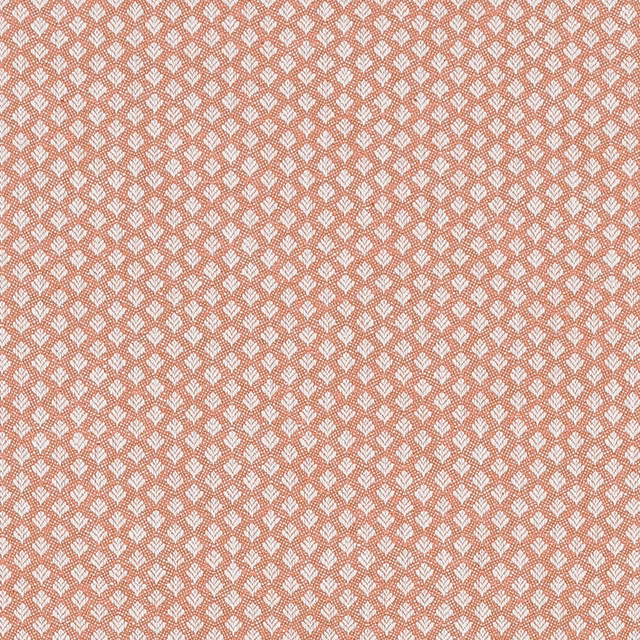 Small repeating pale motif on burnt orange woven fabric swatch