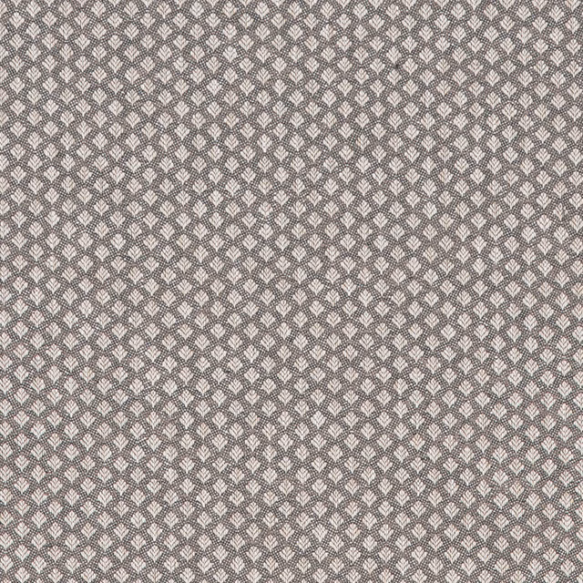 Close-up of small charcoal grey geometric woven fabric with pale motif accents