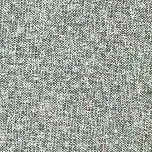 Soft duck egg blue textured woven fabric with small scattered pattern