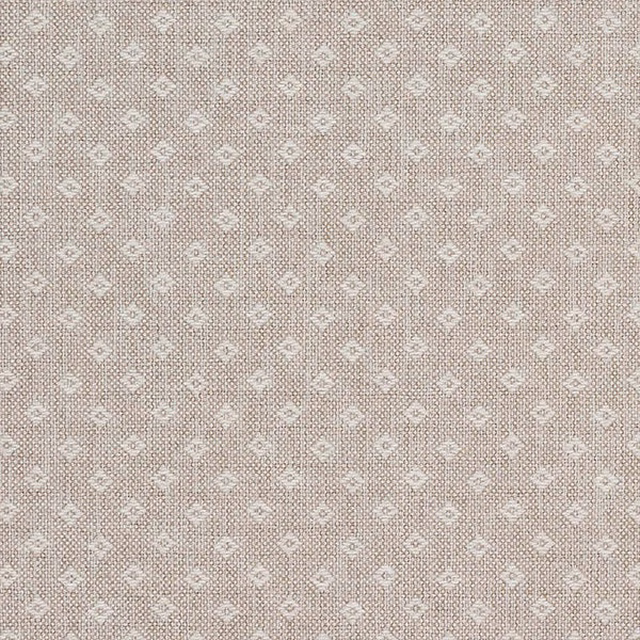 Close-up of soft stone-cream woven fabric with a small repeating diamond motif