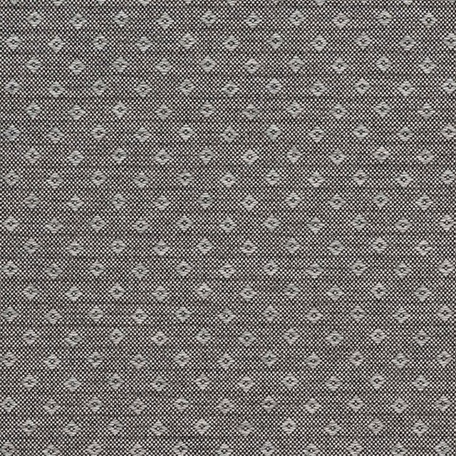 Close-up of a small geometric woven fabric in soft pewter grey
