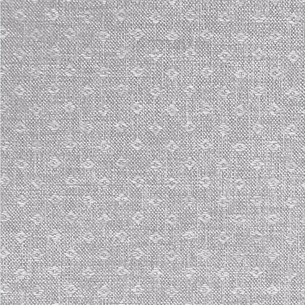 Close-up of a pale silver-grey woven fabric with a small textured pattern