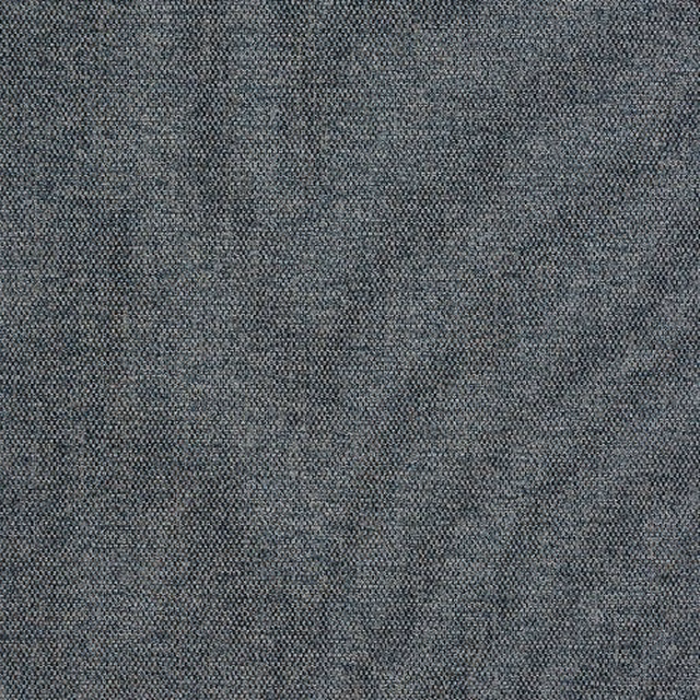 Close-up of a cool grey chambray weave with fine, mottled texture