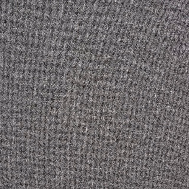 Close-up of soft dove-grey textured fabric with fine tonal weave