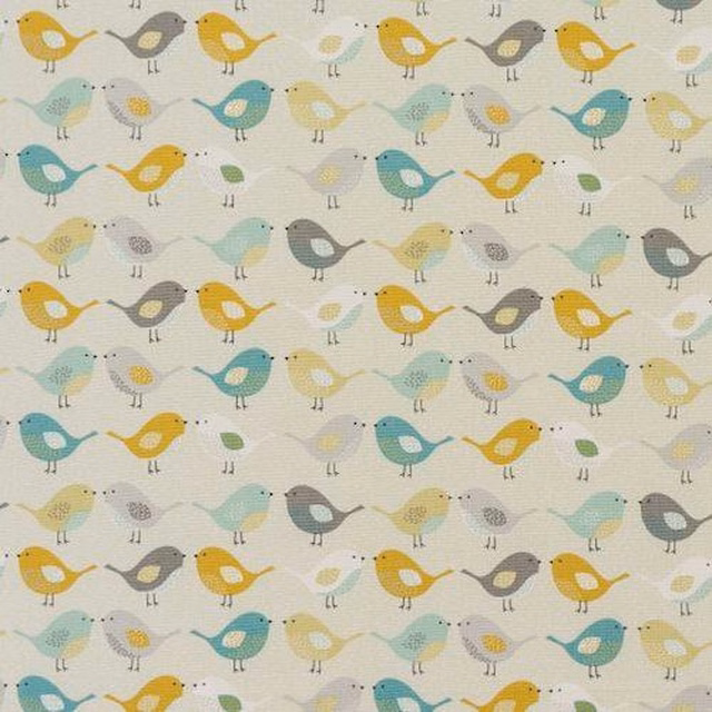 Pale cotton fabric with scattered birds in ochre, aqua, grey and soft yellow