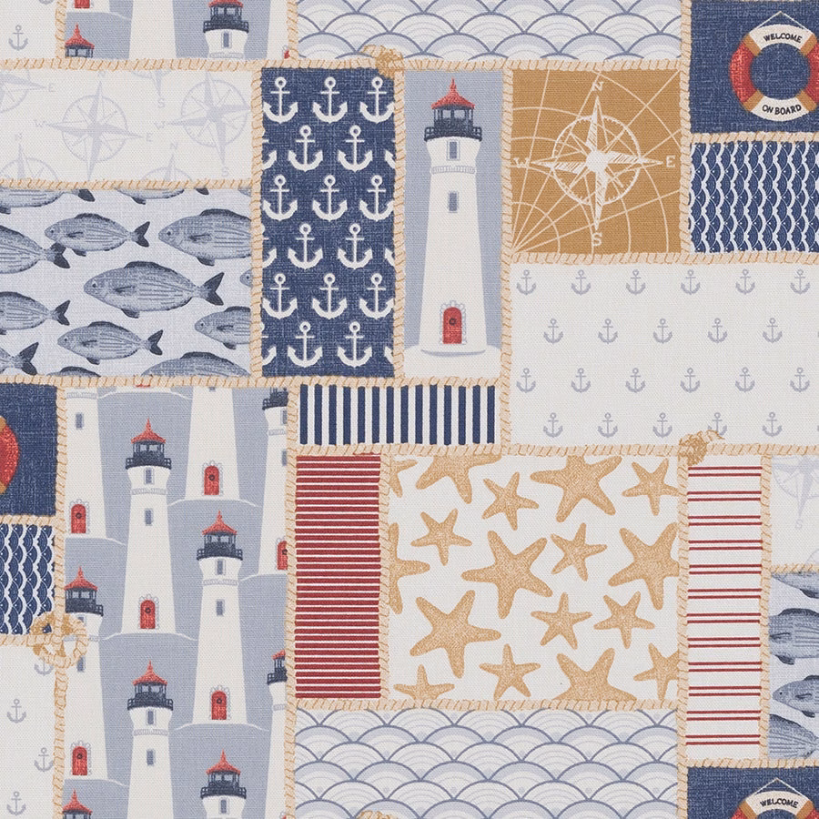 Patchwork coastal cotton fabric with lighthouses, anchors, fish, stars and stripes in navy, white and red.