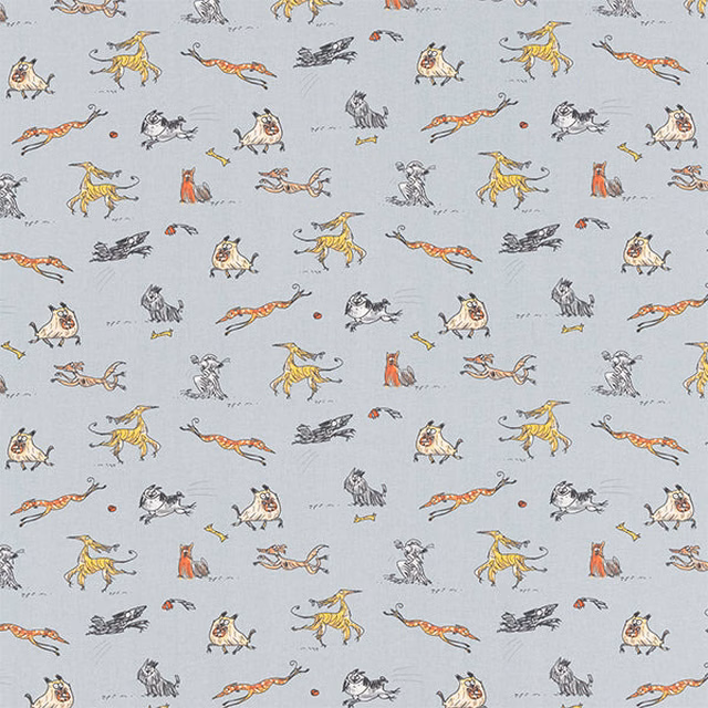 Light blue cotton fabric with scattered sketched dogs in cream, yellow, grey and orange