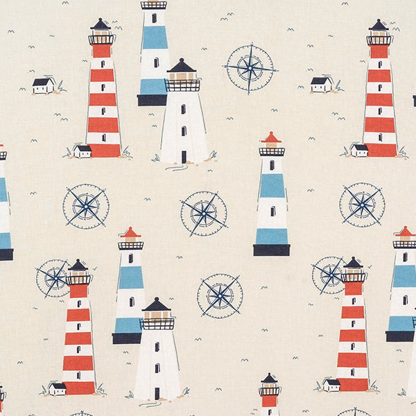 Cream cotton fabric with red and blue lighthouse and compass print