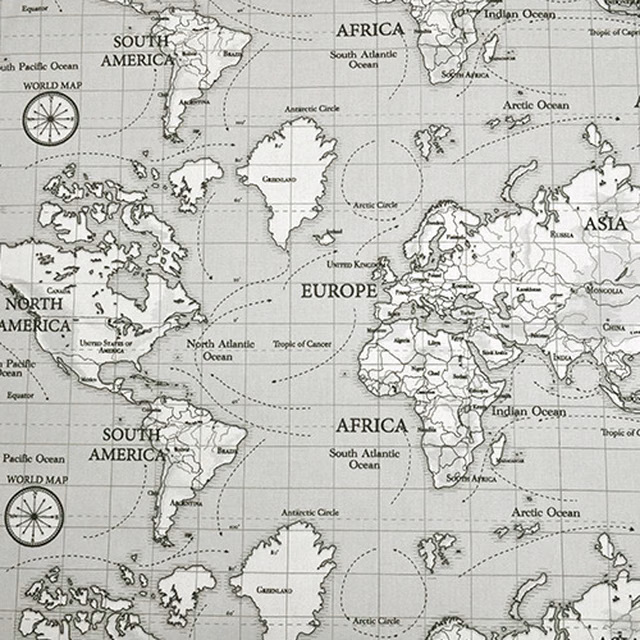 Grey world map print on pale cotton with fine black outlines and grid squares