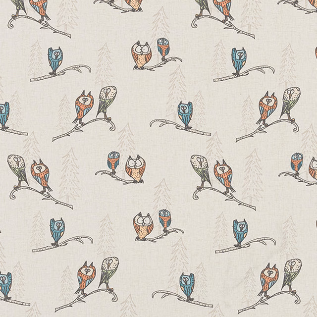 Cream cotton fabric with illustrated owls perched on fine branches
