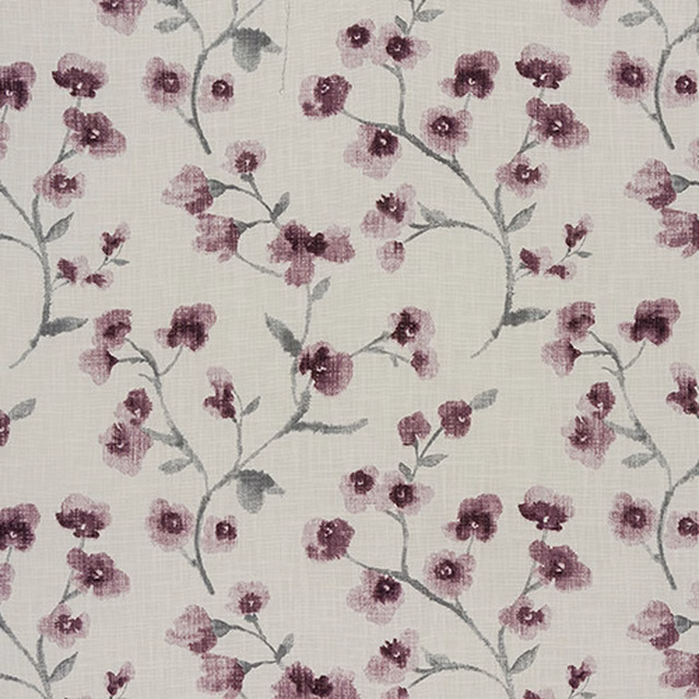 Pale cotton fabric with trailing grape-purple floral sprigs and grey-green stems