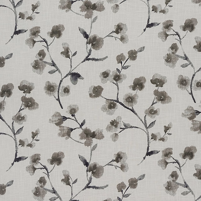 Pale grey cotton fabric with a delicate trailing floral print in warm grey and charcoal