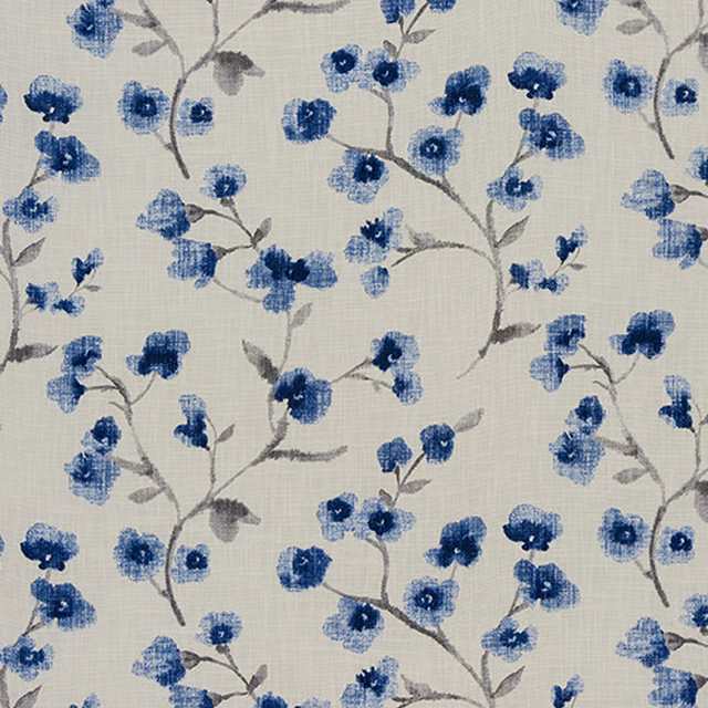Blue and grey painterly floral print on a pale cotton ground